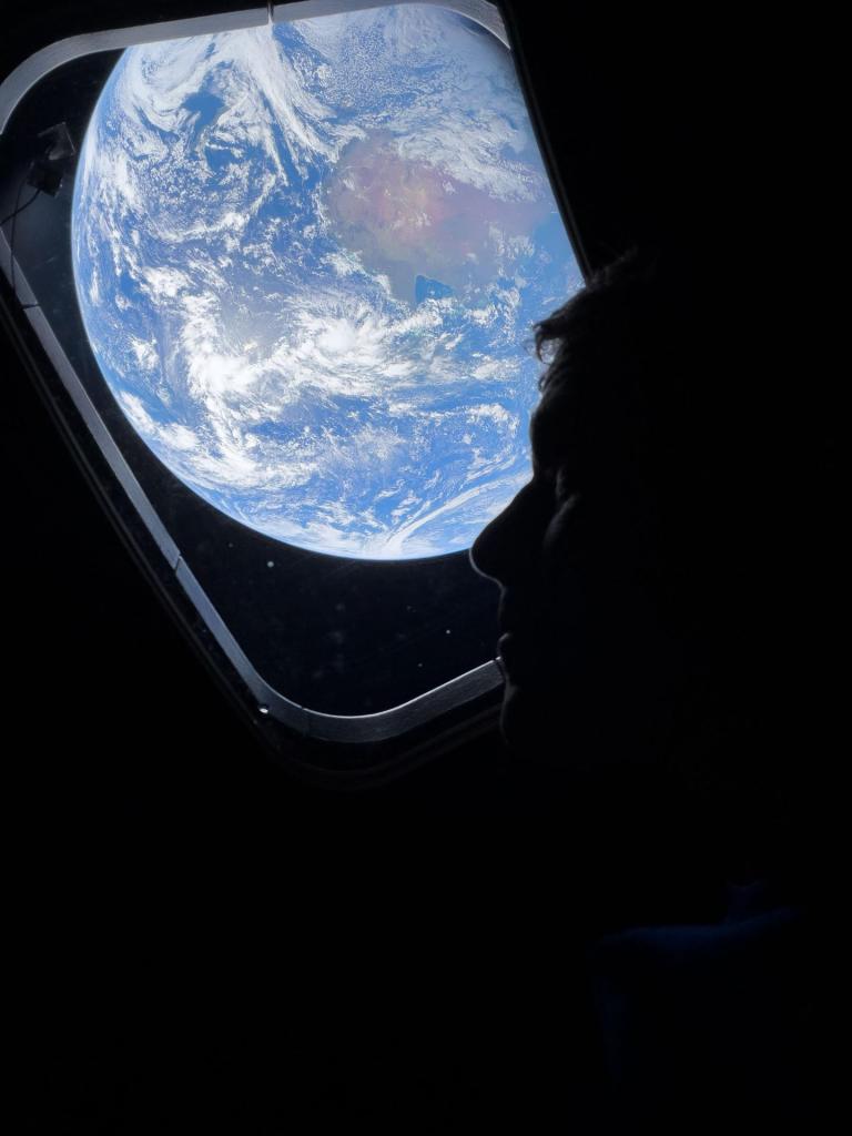 Home, Seen From Orion.
NASA astronaut and Artemis II Commander Reid Wiseman peers out of one of the Orion spacecraft's main cabin windows, looking back at Earth, as the crew travels towards the Moon.
Image Credit: NASA